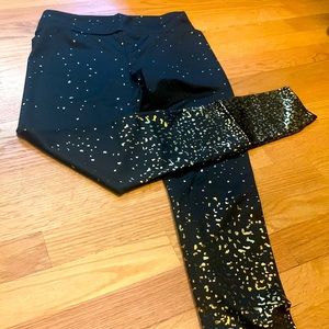 Black leggings with gold detail. Size small.